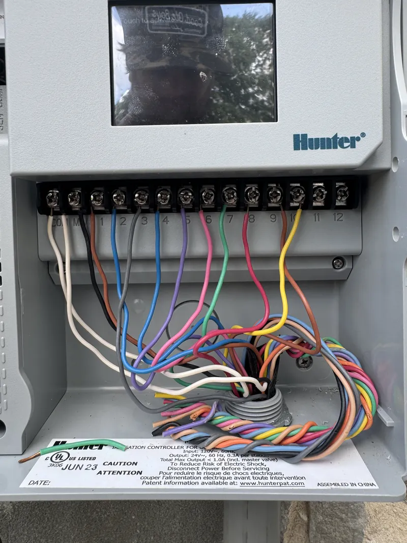 Open Hunter irrigation controller with a terminal strip wired to zones 1 through 10